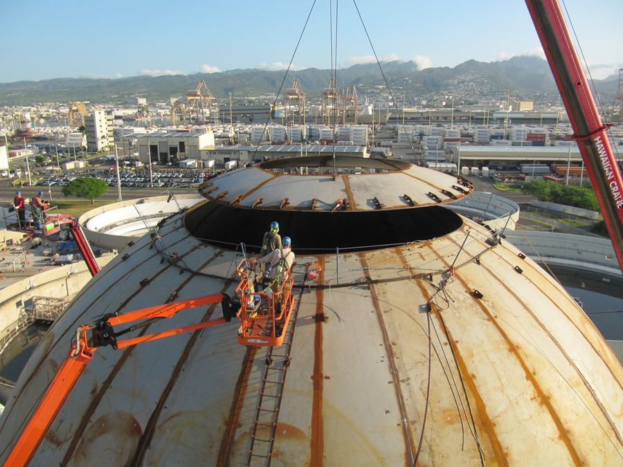 Boilermakers landing a tank dome above Honolulu harbor